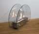 Hippe biohaard met rond glas en een stalen brander. Brandtijd 2-3 uur. Maat H: 28 x B: 35 x D: 12 cm.